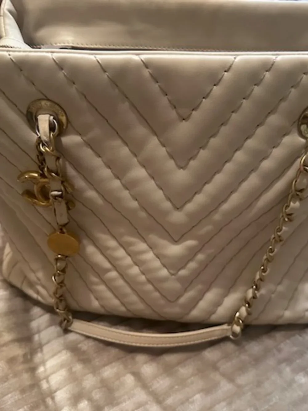 Chanel Surpique Chevron CC Charm Tote (often referred as Chevron V-Stitch Tote